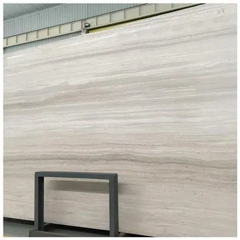 Laje de mármore com veios de madeira branca