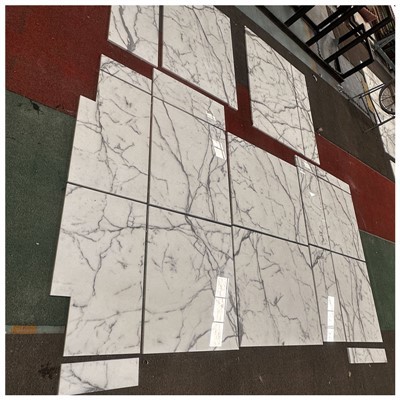 Tiles de mármore estatuário